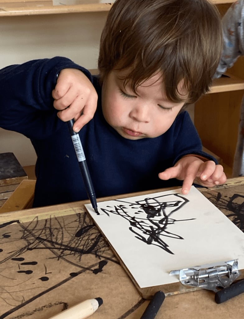 Child drawing on table Bear Park