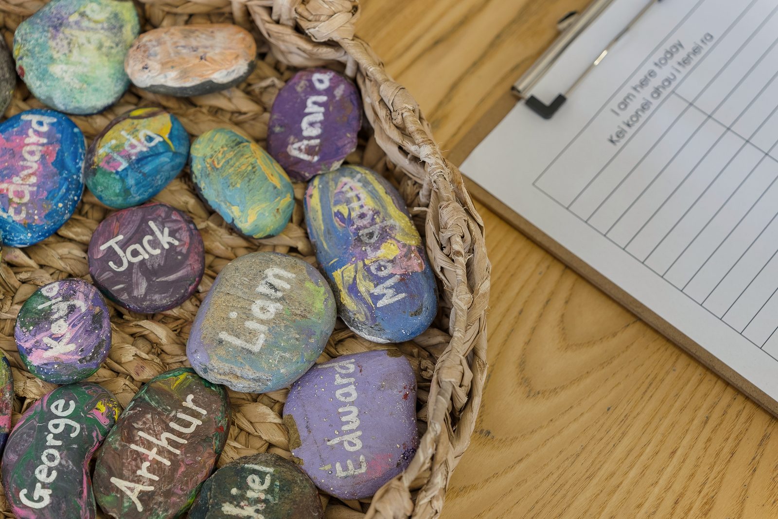 Painted name stones at the morning sign-in